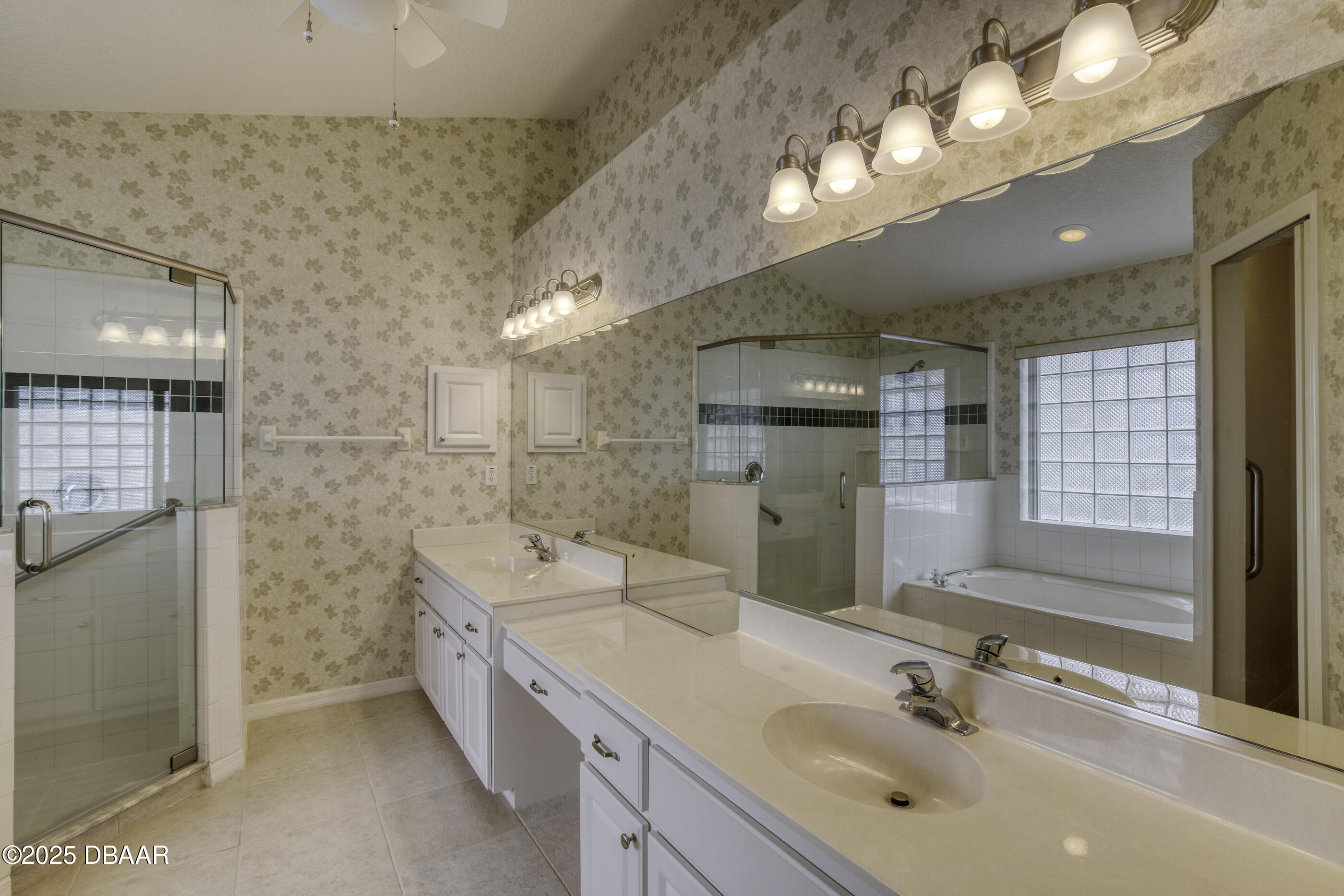 38 Lake Walden Trail Ormond Beach, FL 32174 - Photo 43 of 72 a bathroom with a double vanity sink mirror and double