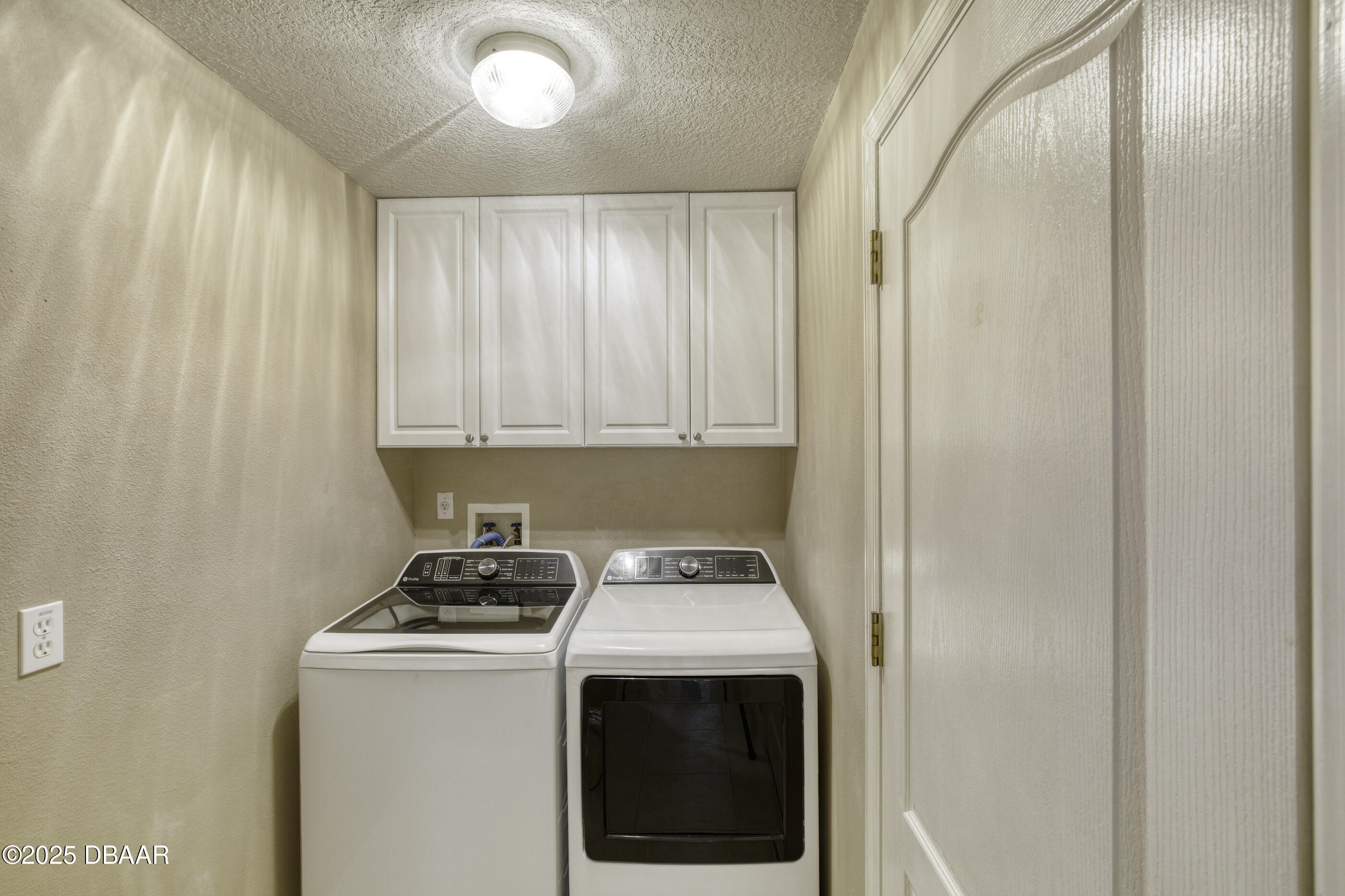 38 Lake Walden Trail Ormond Beach, FL 32174 - Photo 51 of 72 a utility room with dryer and washer