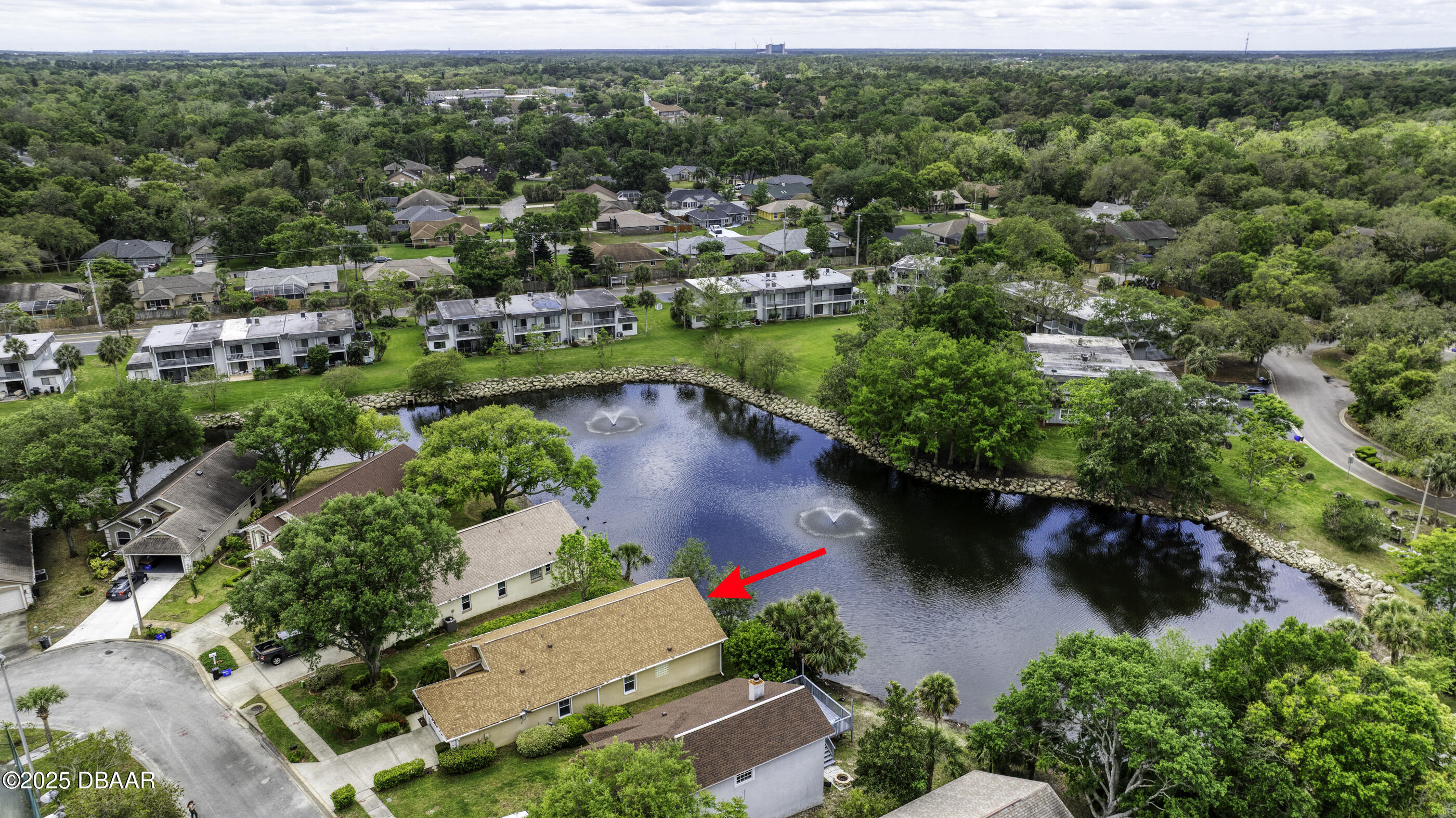 38 Lake Walden Trail Ormond Beach, FL 32174 - Photo 72 of 72 an aerial view of lake residential house with outdoor space and trees all around