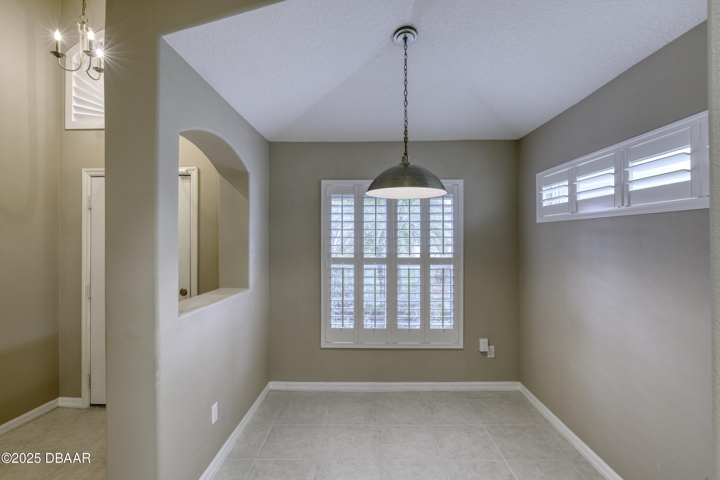 38 Lake Walden Trail Ormond Beach, FL 32174 - Photo 10 of 72 a view of empty room with windows