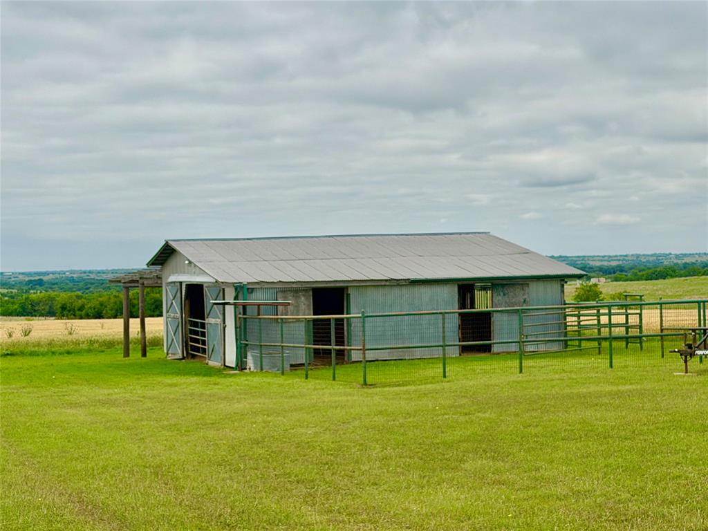 14717 Burns Branch Road Krum, TX 76249 - Photo 37 of 40 36x36 Barn with 3 stalls and tack room PLUS. full electric and water