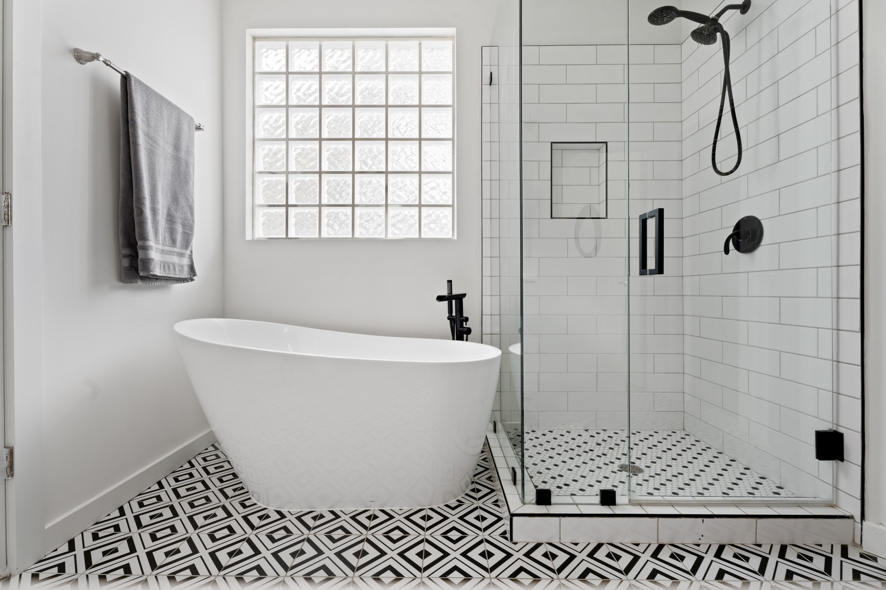 102 Hurst Creek Road Lakeway, TX 78734 - Photo 18 of 29 a white bath tub sitting next to a shower