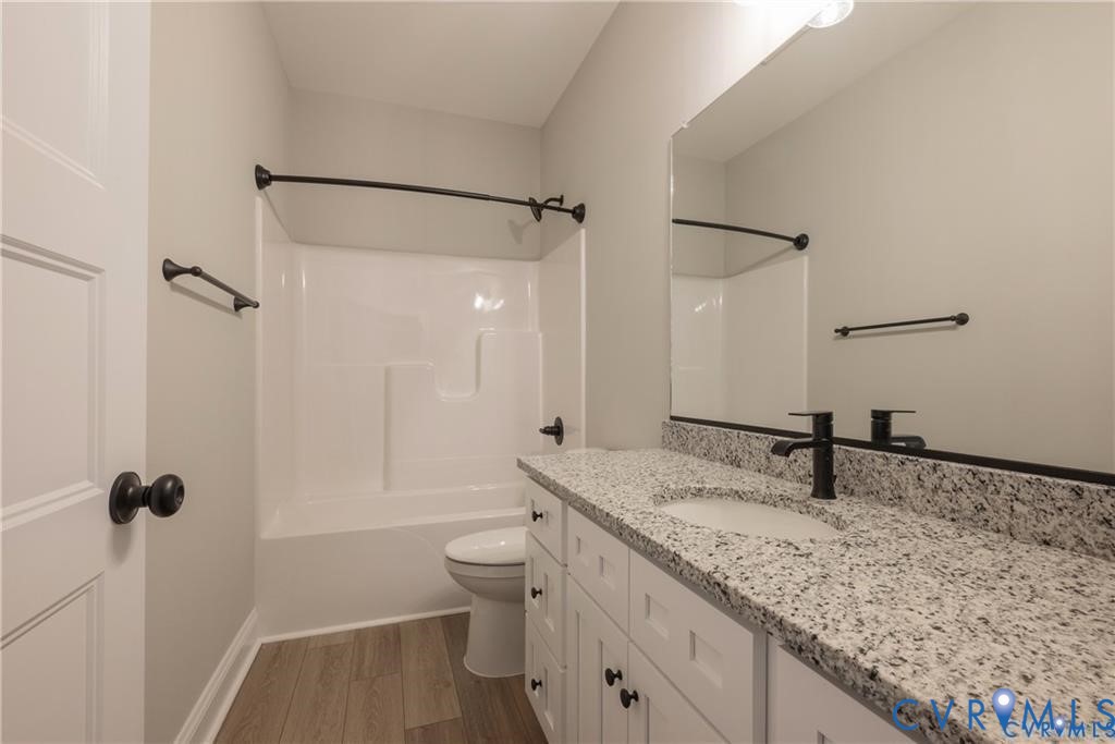 2223 Ridge Road Arvonia, VA 23004 - Photo 18 of 32 Bathroom featuring a white vanity with an integrat