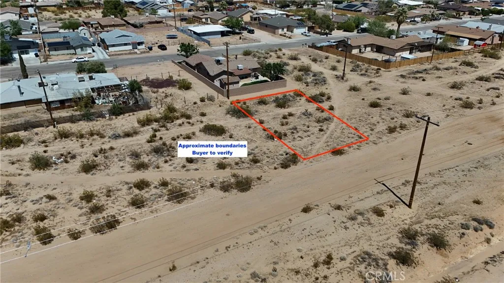 744 West Bowman Road Ridgecrest, CA 93555 - Photo 2 of 9 Red boundary lines on pictures are an estimate and for marketing purposes only. Buyer to verify all aspects of this property including, but not limited to utilities, assessments, boundaries, usage, access, and zoning to satisfy themselves.