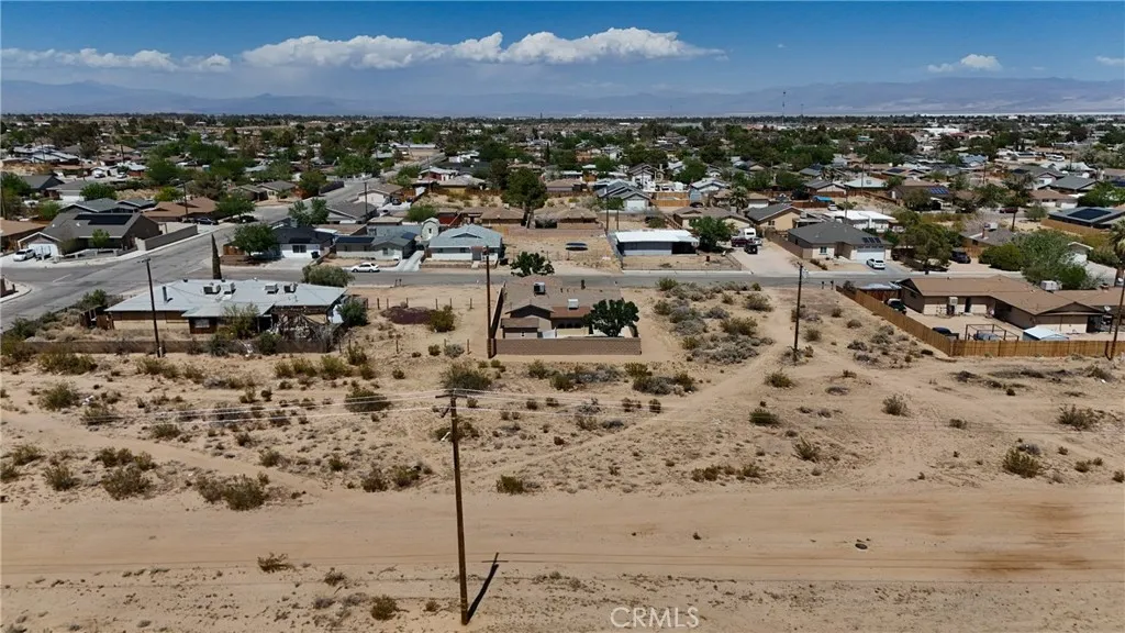 744 West Bowman Road Ridgecrest, CA 93555 - Photo 6 of 9 Red boundary lines on pictures are an estimate and for marketing purposes only. Buyer to verify all aspects of this property including, but not limited to utilities, assessments, boundaries, usage, access, and zoning to satisfy themselves.