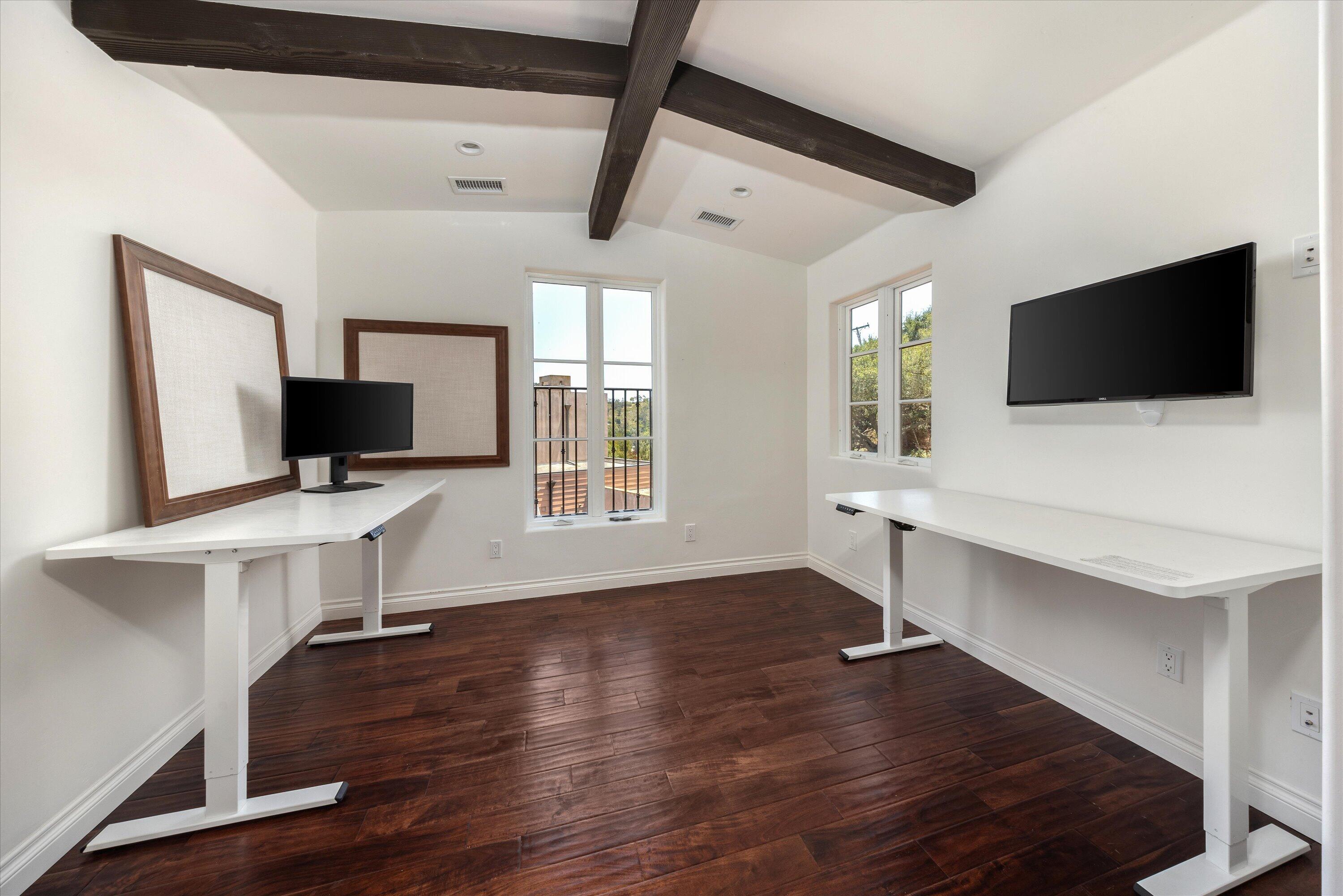 333 Conejo Road Santa Barbara, CA 93103 - Photo 27 of 43 a view of a livingroom with furniture and a flat screen tv