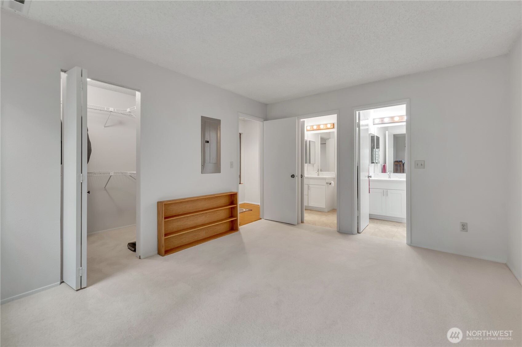 7339 Old Redmond Road, Unit 118 Redmond, WA 98052 - Photo 14 of 25 wooden floor with white walls