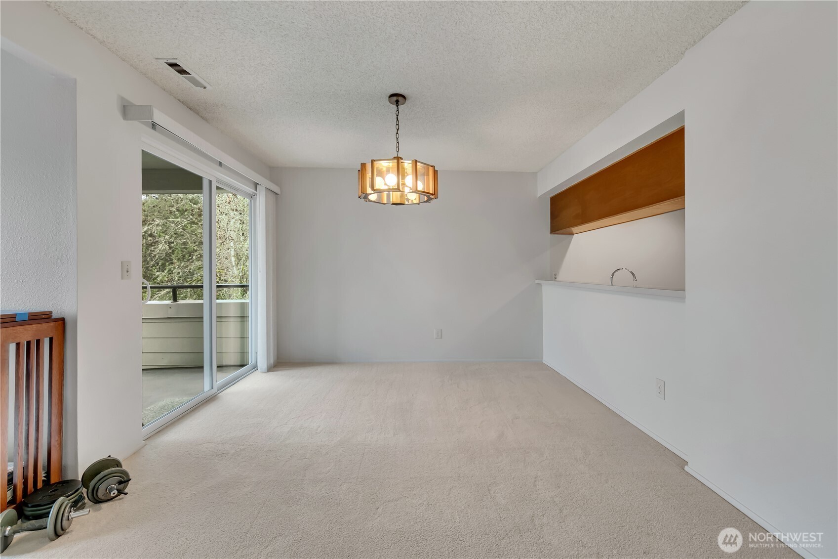 7339 Old Redmond Road, Unit 118 Redmond, WA 98052 - Photo 15 of 25 a view of an empty room with a window