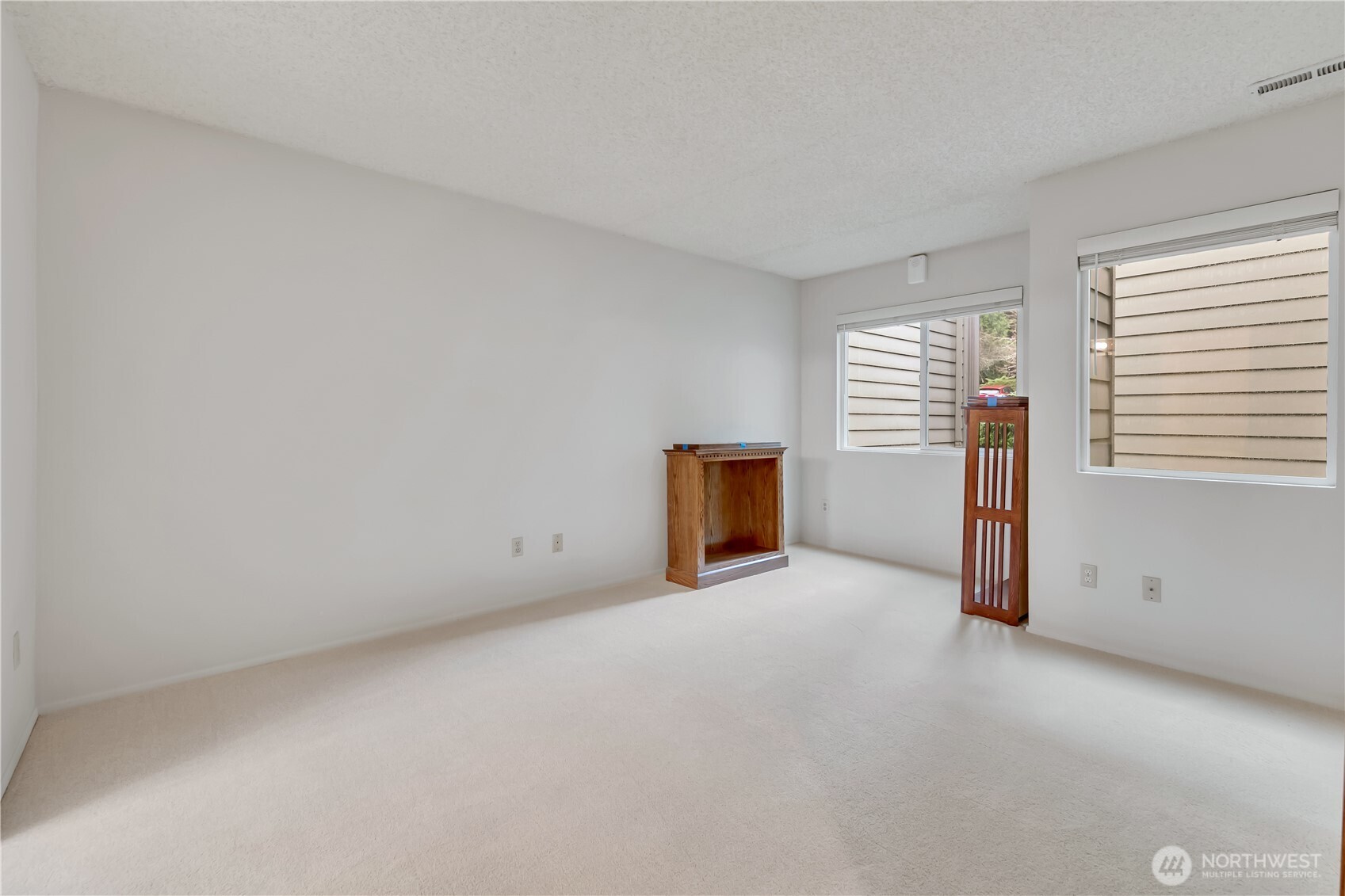 7339 Old Redmond Road, Unit 118 Redmond, WA 98052 - Photo 16 of 25 an empty room with windows