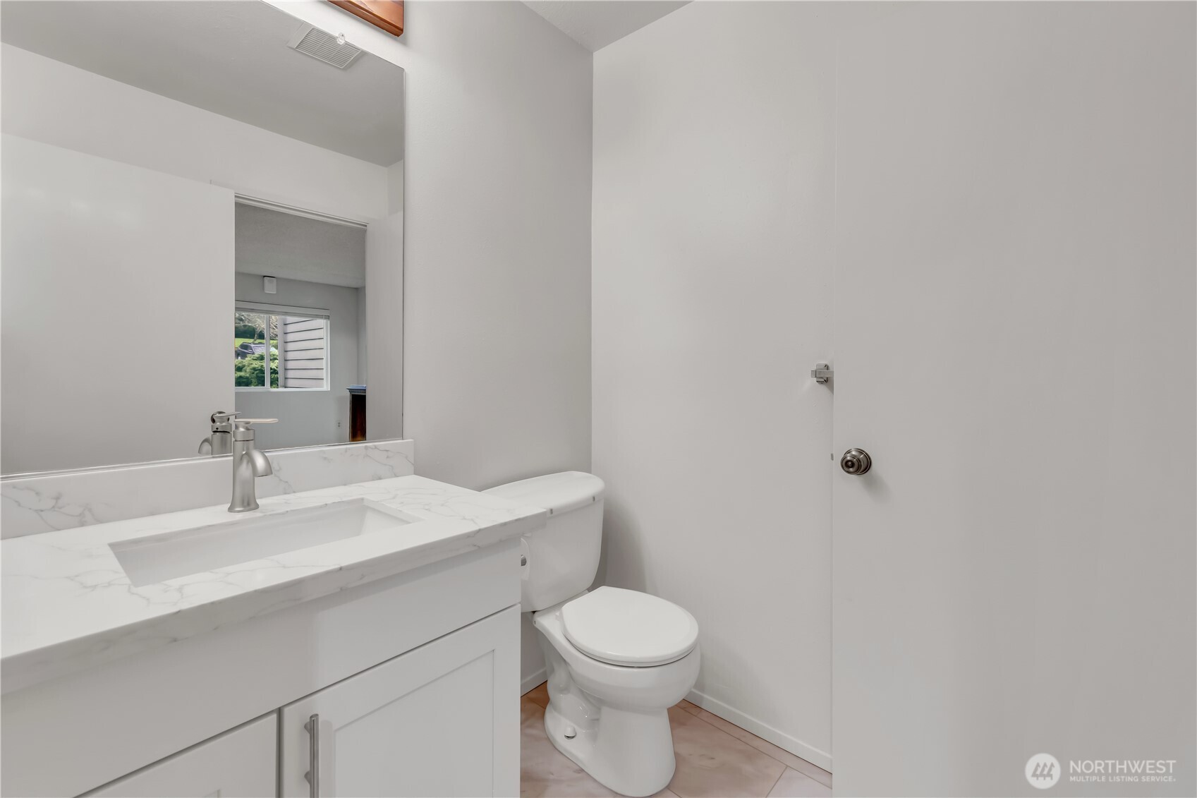 7339 Old Redmond Road, Unit 118 Redmond, WA 98052 - Photo 20 of 25 a bathroom with a sink a toilet and mirror