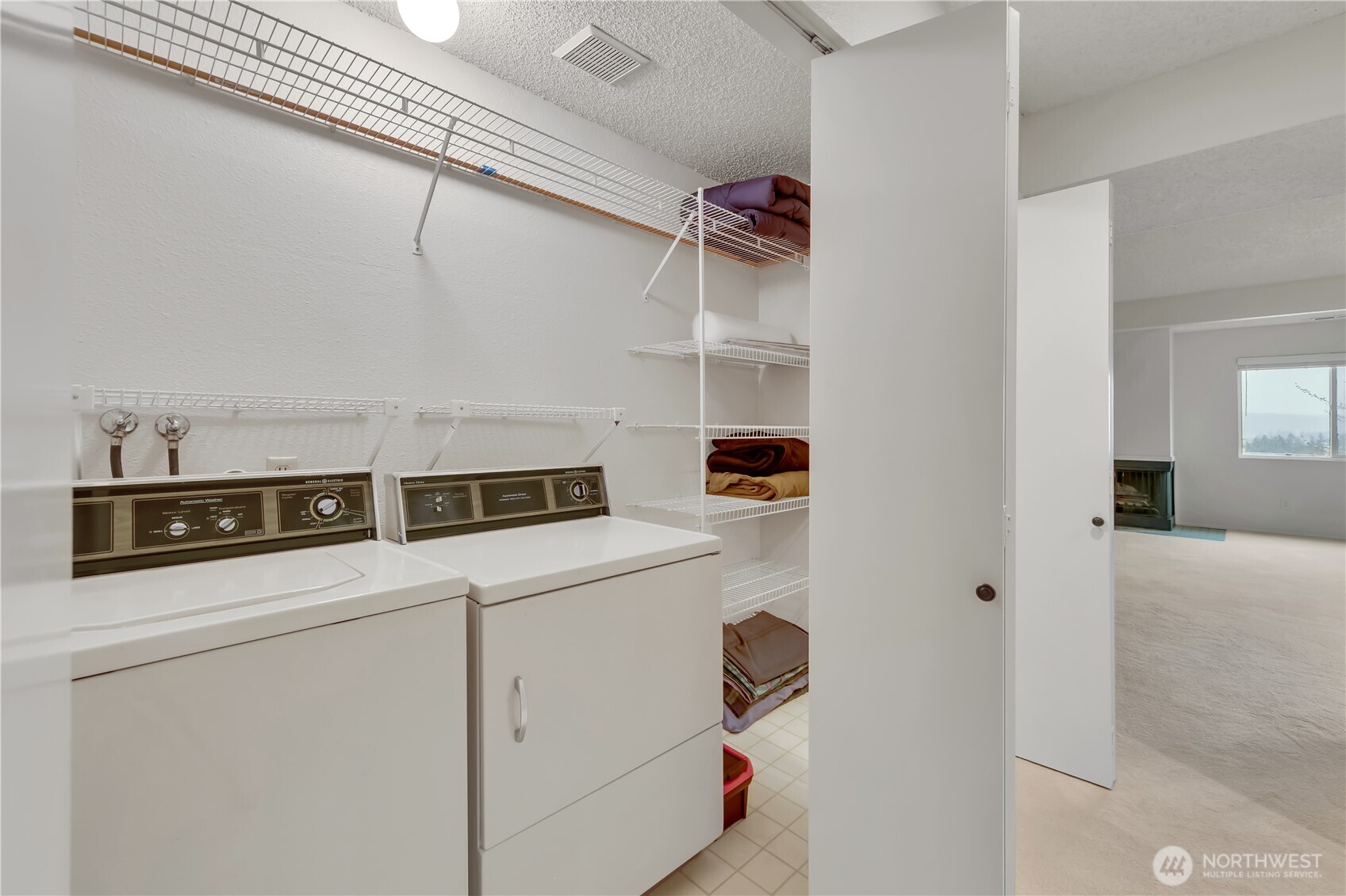 7339 Old Redmond Road, Unit 118 Redmond, WA 98052 - Photo 21 of 25 a utility room with dryer and washer