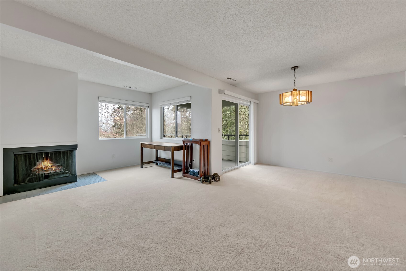 7339 Old Redmond Road, Unit 118 Redmond, WA 98052 - Photo 4 of 25 a view of a livingroom with furniture and a fireplace