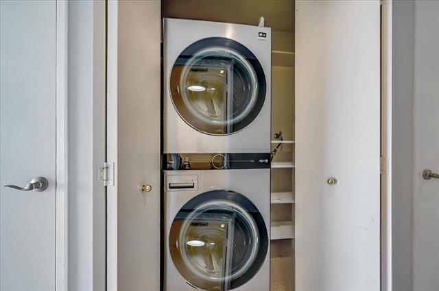262 Beachview Avenue, Unit 5 Pacifica, CA 94044 - Photo 23 of 23 a close view of a utility room with dryer and washer