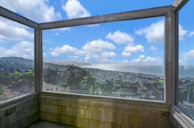 262 Beachview Avenue, Unit 5 Pacifica, CA 94044 - Photo 8 of 23 a view of a glass door and a window