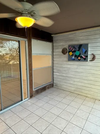 a view of entryway with a table and chairs