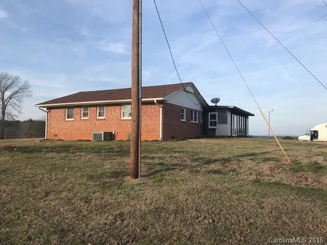 299 Abrams Moore Road Rutherfordton, NC 28139 - Photo 2 of 14 a front view of a house with a yard