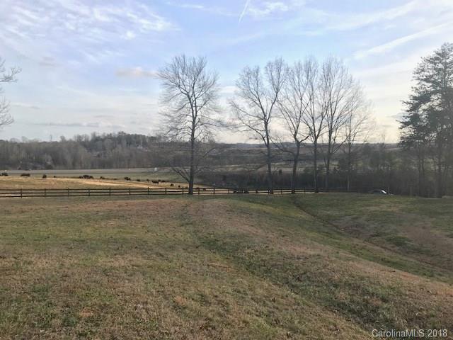 299 Abrams Moore Road Rutherfordton, NC 28139 - Photo 4 of 14 a view of a field with wooden fence
