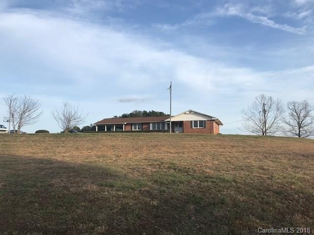 299 Abrams Moore Road Rutherfordton, NC 28139 - Photo 6 of 14 a front view of a house with a yard