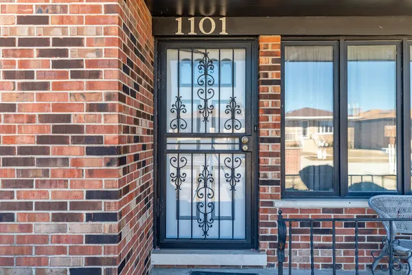 a front view of a building with a glass door