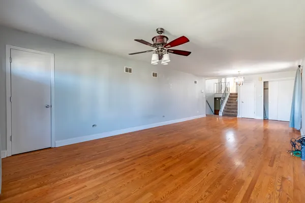 a kitchen with stainless steel appliances granite countertop a stove and a refrigerator