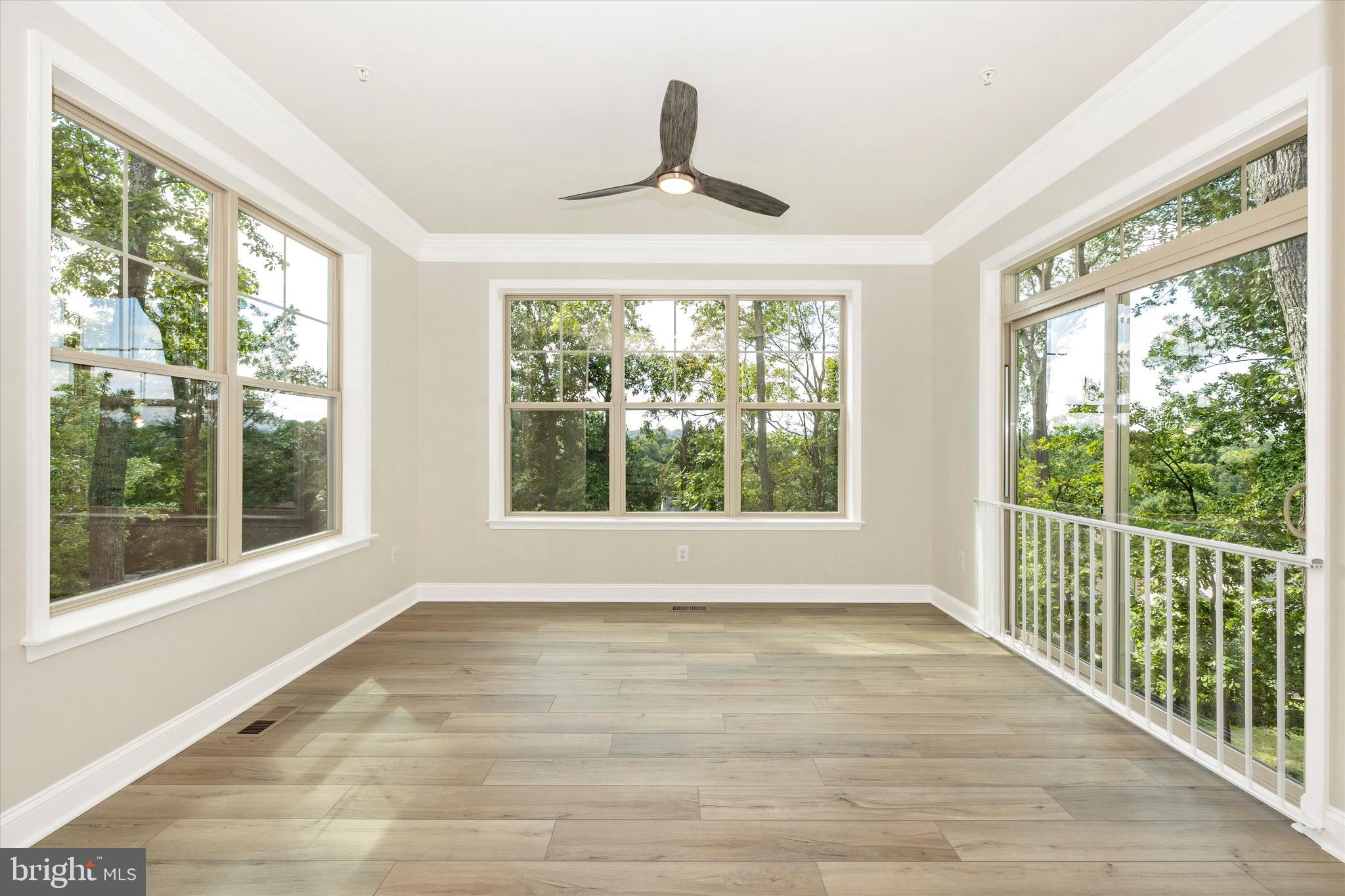 391 Masters Road New Market, MD 21774 - Photo 31 of 71 a view of an empty room with wooden floor and a window