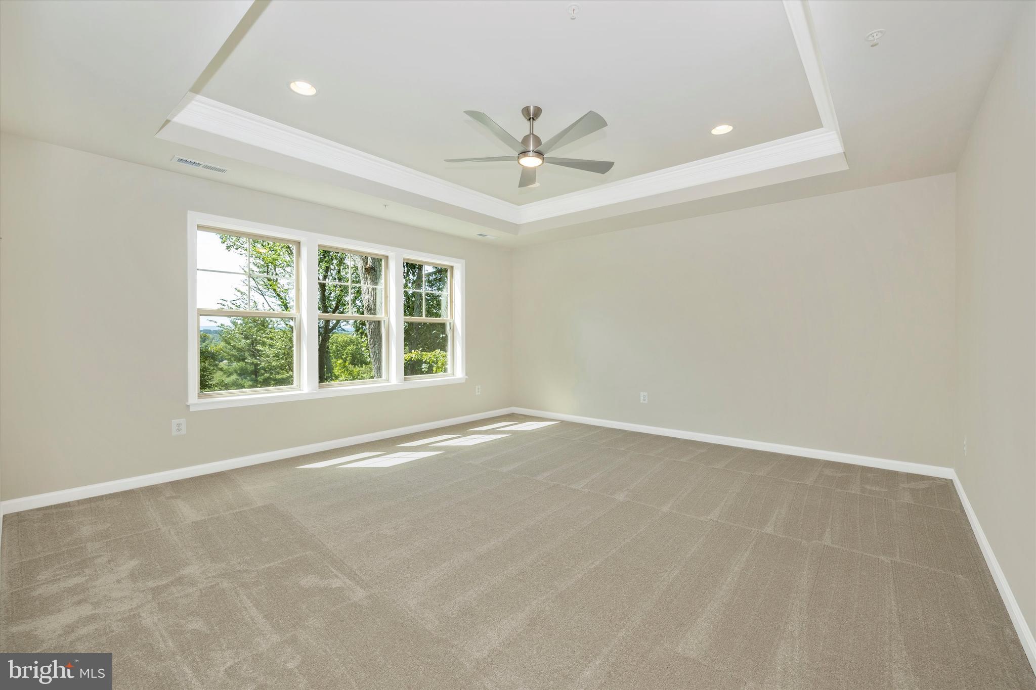 391 Masters Road New Market, MD 21774 - Photo 37 of 71 an empty room with windows and fan