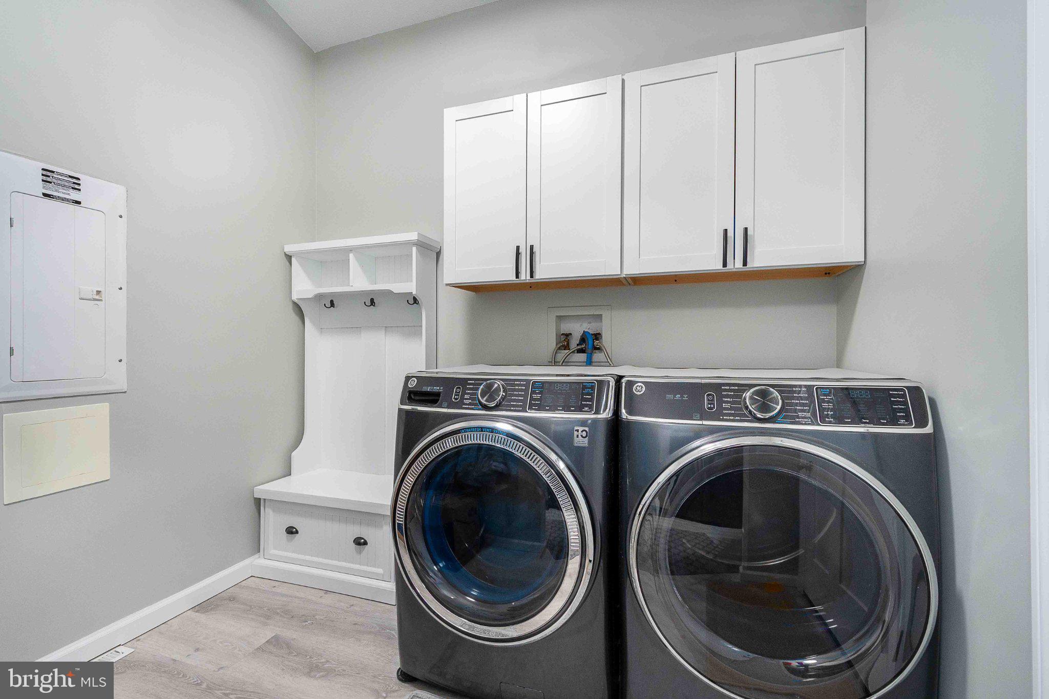 511 Hill Top Road Oakland, MD 21550 - Photo 23 of 51 Modern laundry room with sleek appliances.