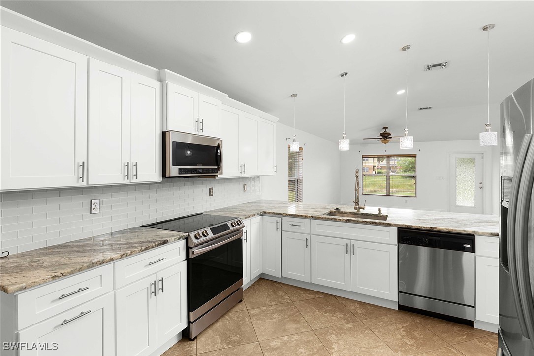 8461 Gassner Way Lehigh Acres, FL 33972 - Photo 9 of 27 Gallery Image 9