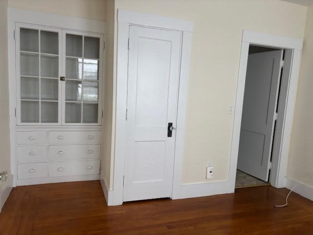 9 Windsor Avenue, Unit 9A Acton, MA 01720 - Photo 6 of 10 a view of empty room with wooden floor and cabinet