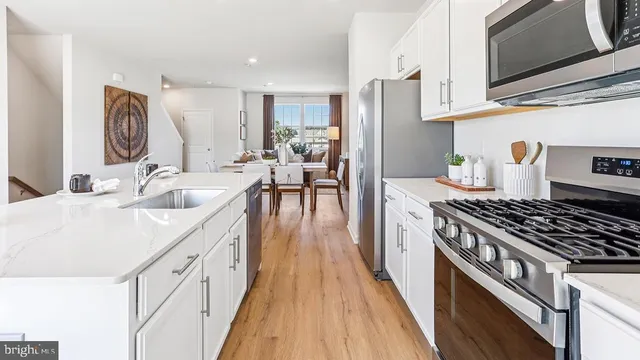 a bathroom with a sink and mirror