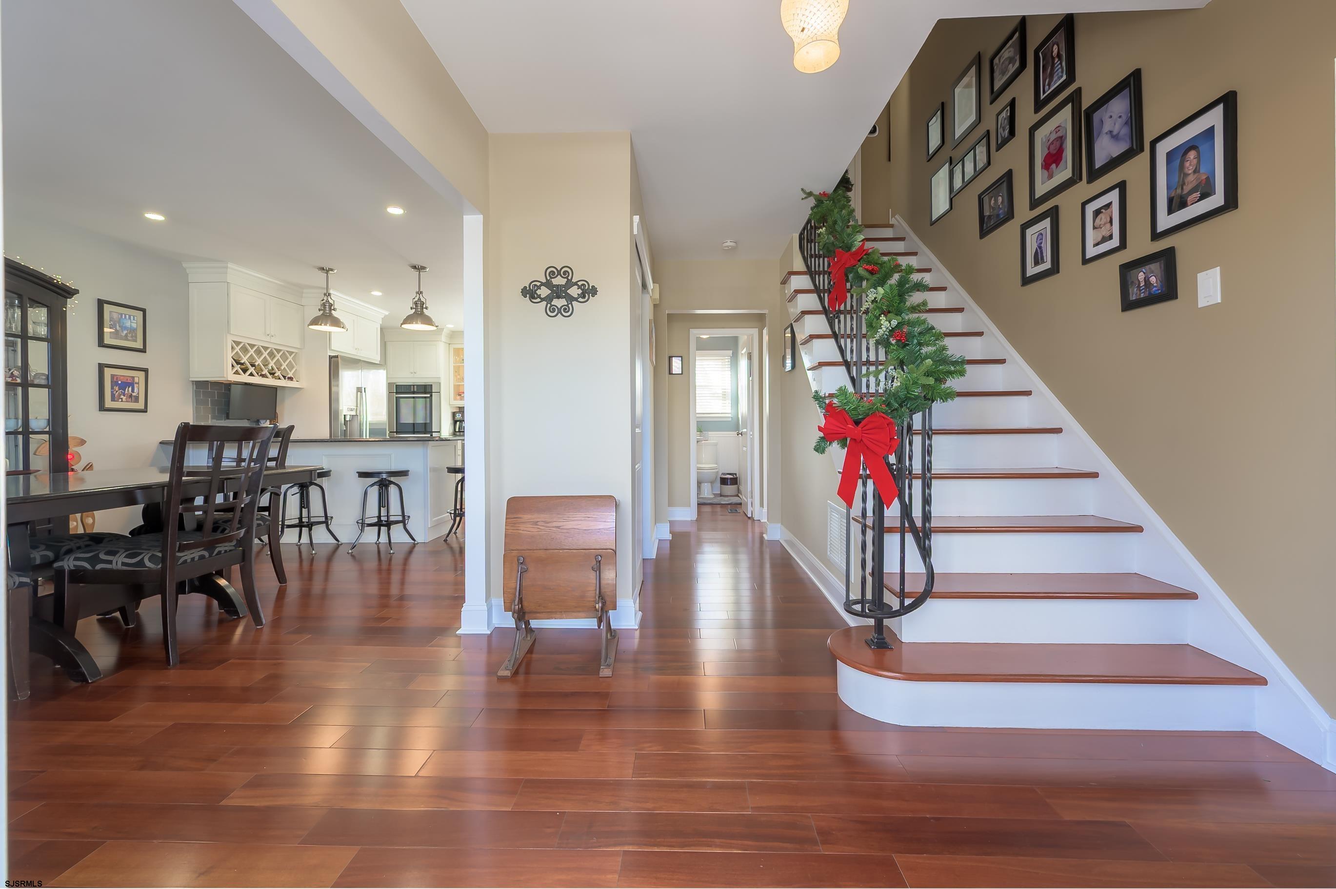 1 Exeter Court Margate City, NJ 08402 - Photo 1 of 25 a view of entryway and hall with wooden floor
