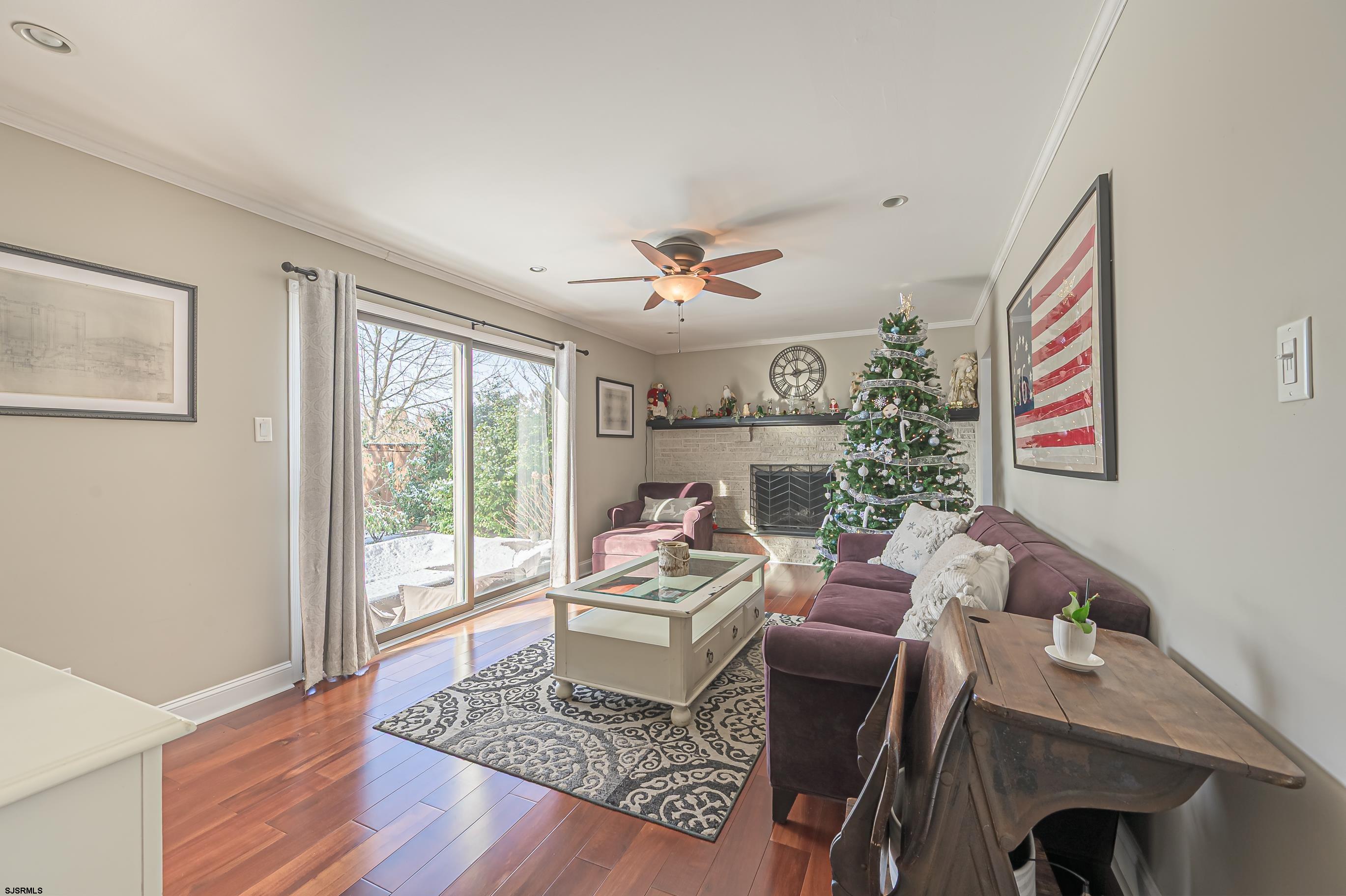 1 Exeter Court Margate City, NJ 08402 - Photo 19 of 25 a living room with furniture and a window