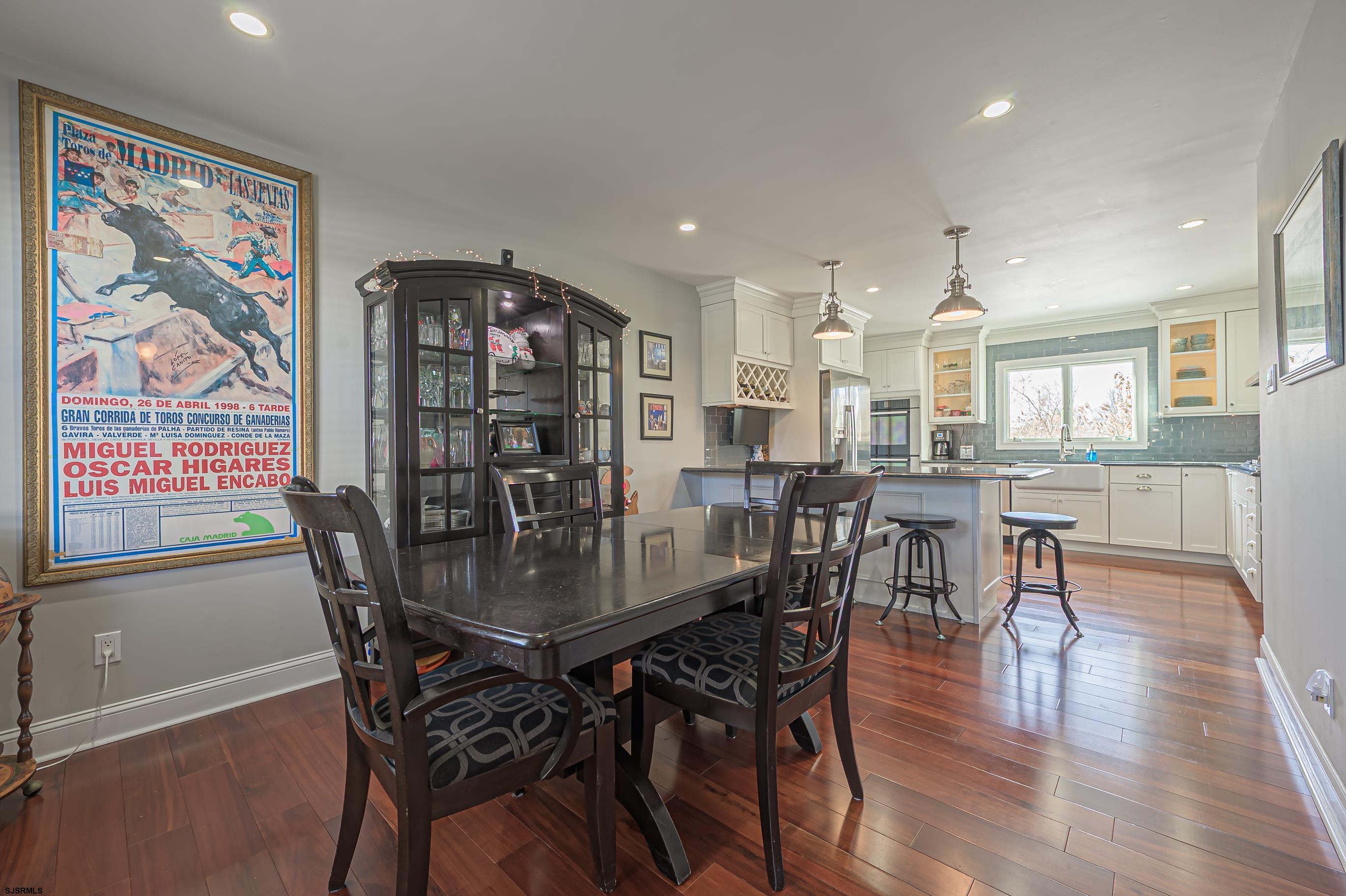 1 Exeter Court Margate City, NJ 08402 - Photo 3 of 25 a dining room with furniture and wooden floor
