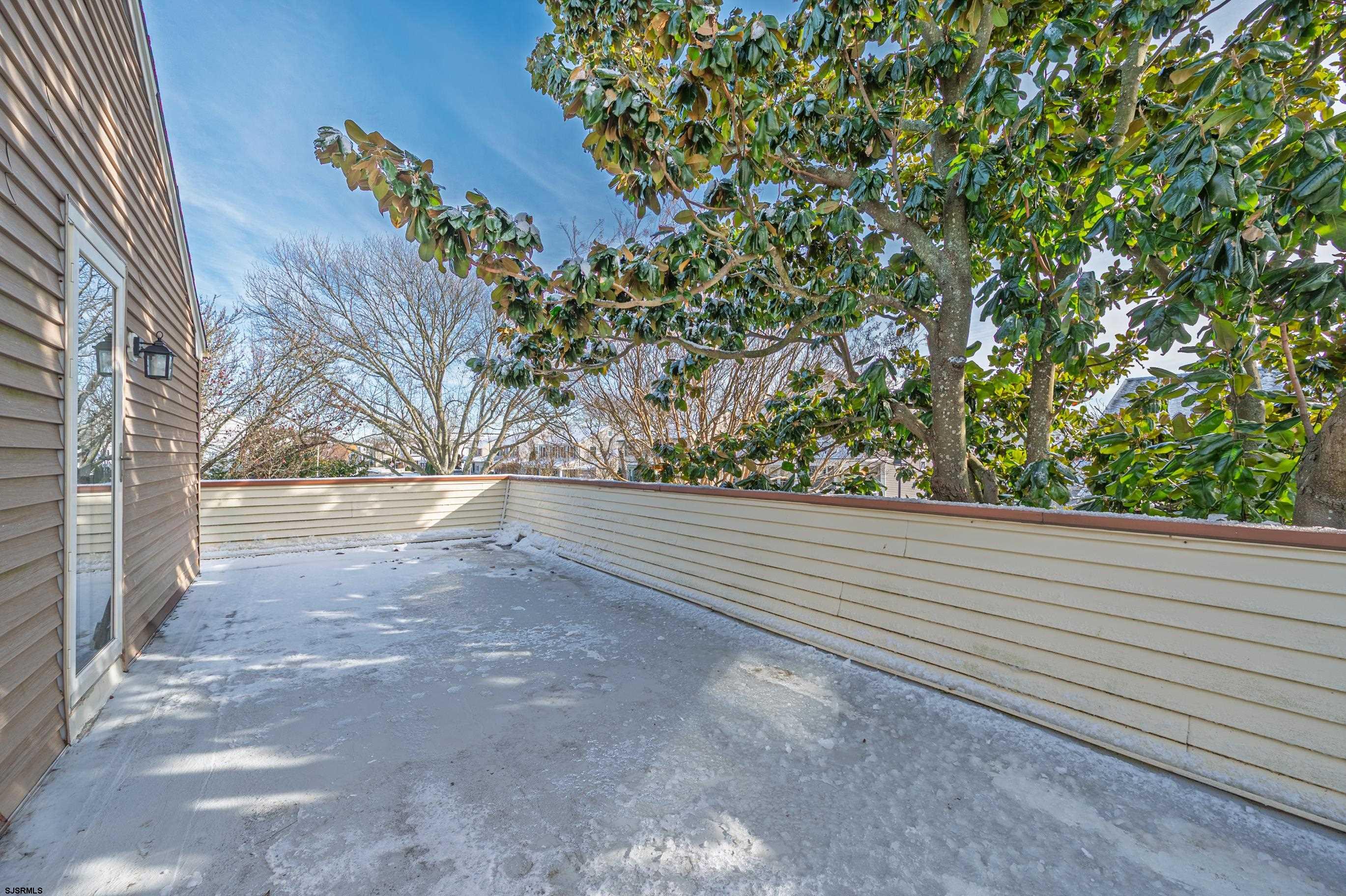 1 Exeter Court Margate City, NJ 08402 - Photo 7 of 25 a view of a yard