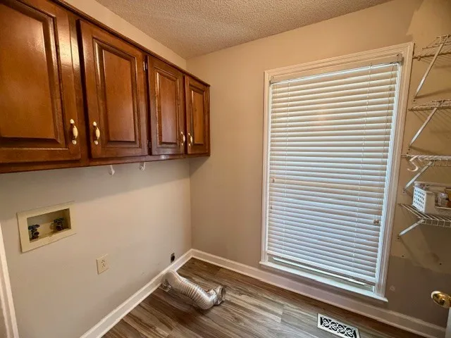 a view of a refrigerator and window