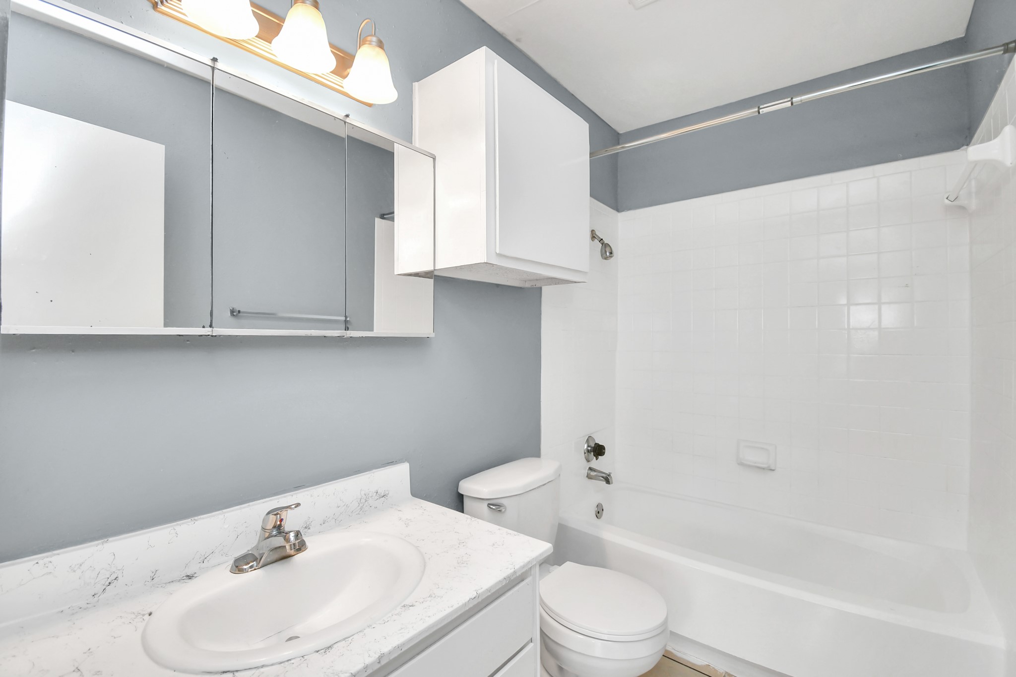 5959 Bonhomme Road, Unit 125R Houston, TX 77036 - Photo 26 of 26 a bathroom with a sink a toilet and shower