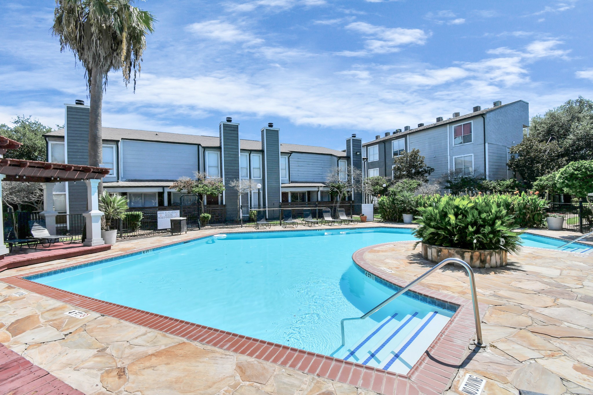 5959 Bonhomme Road, Unit 125R Houston, TX 77036 - Photo 12 of 26 a swimming pool with outdoor seating and yard