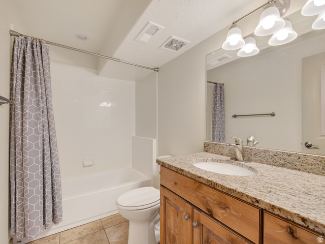 1279 West 1500th Street North Mapleton, UT 84664 - Photo 62 of 83 Bathroom featuring a wood-finish vanity with a granite countertop and an undermount sink