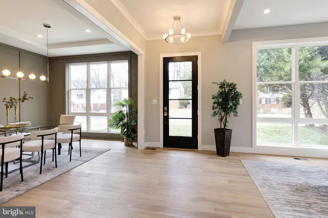 a view of a livingroom with furniture and windows