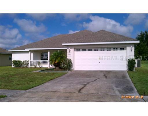 a black and white photo of a house