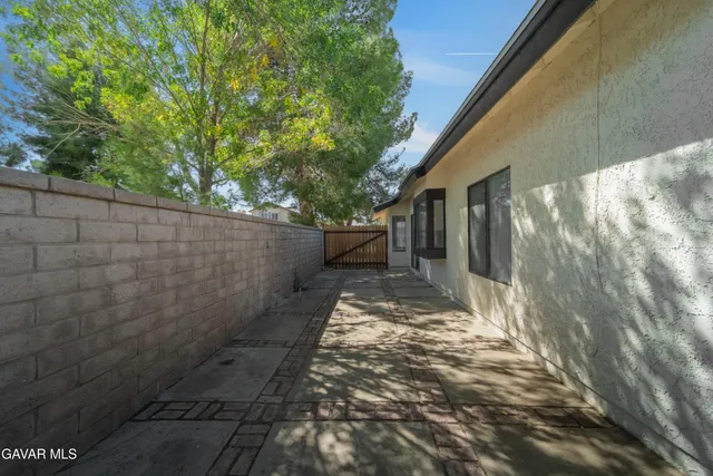 a view of backyard with green space