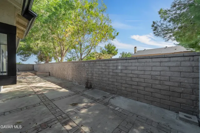 an aerial view of house with yard