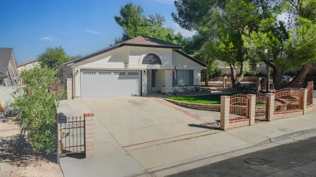 a house with trees in the background