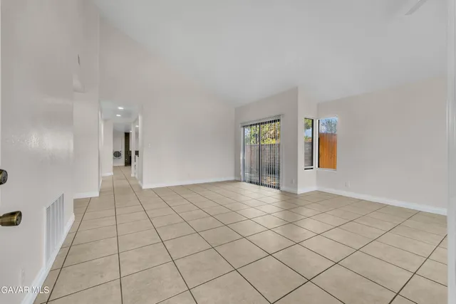 a view of an empty room and window