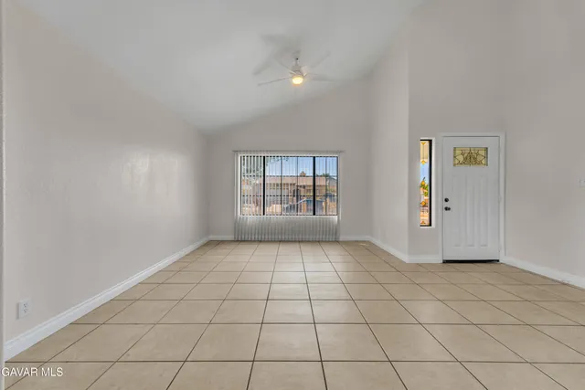 a view of an empty room and window