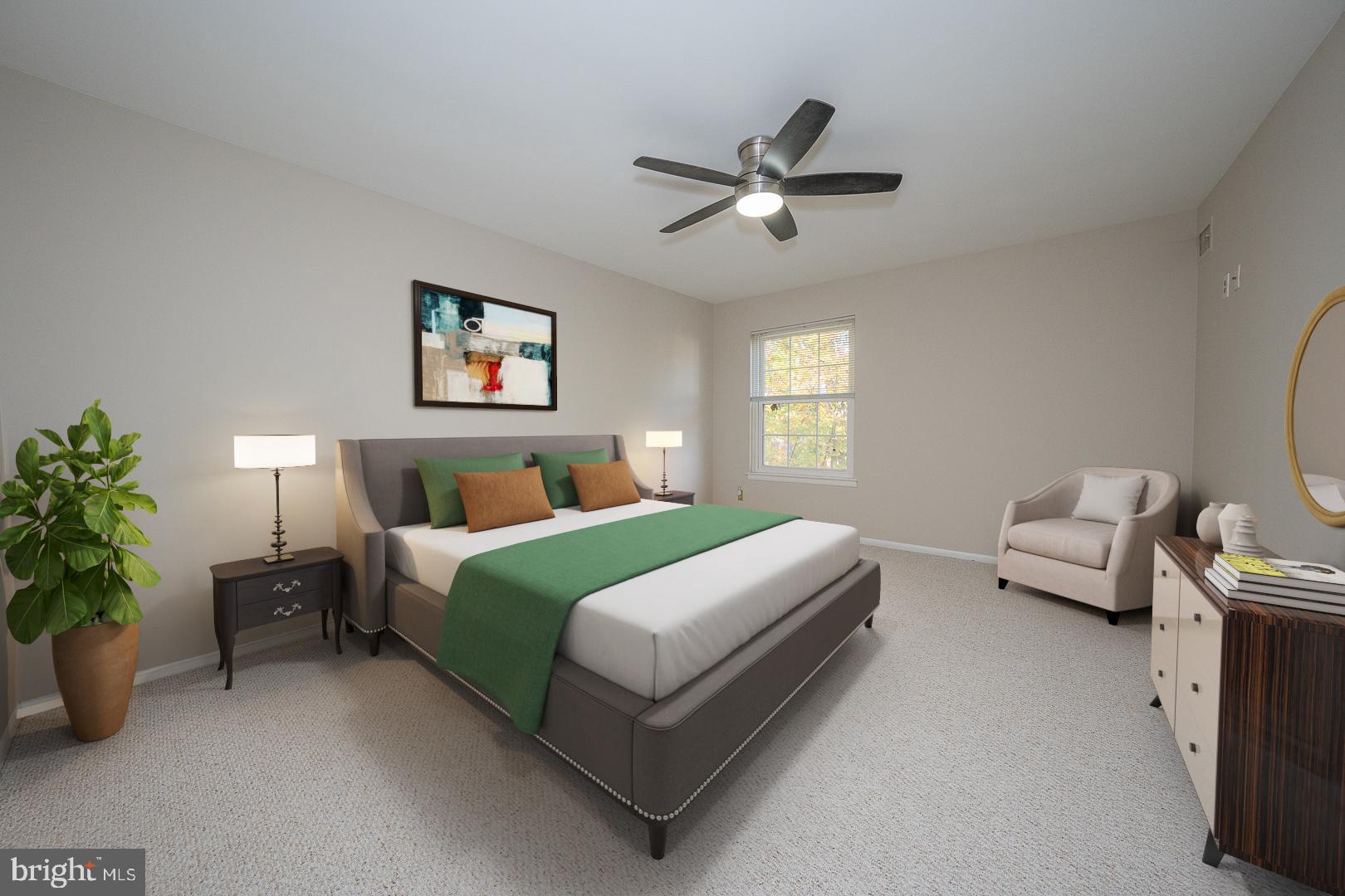 446 Drummers Lane Wayne, PA 19087 - Photo 17 of 29 a bedroom with a bed couch and window