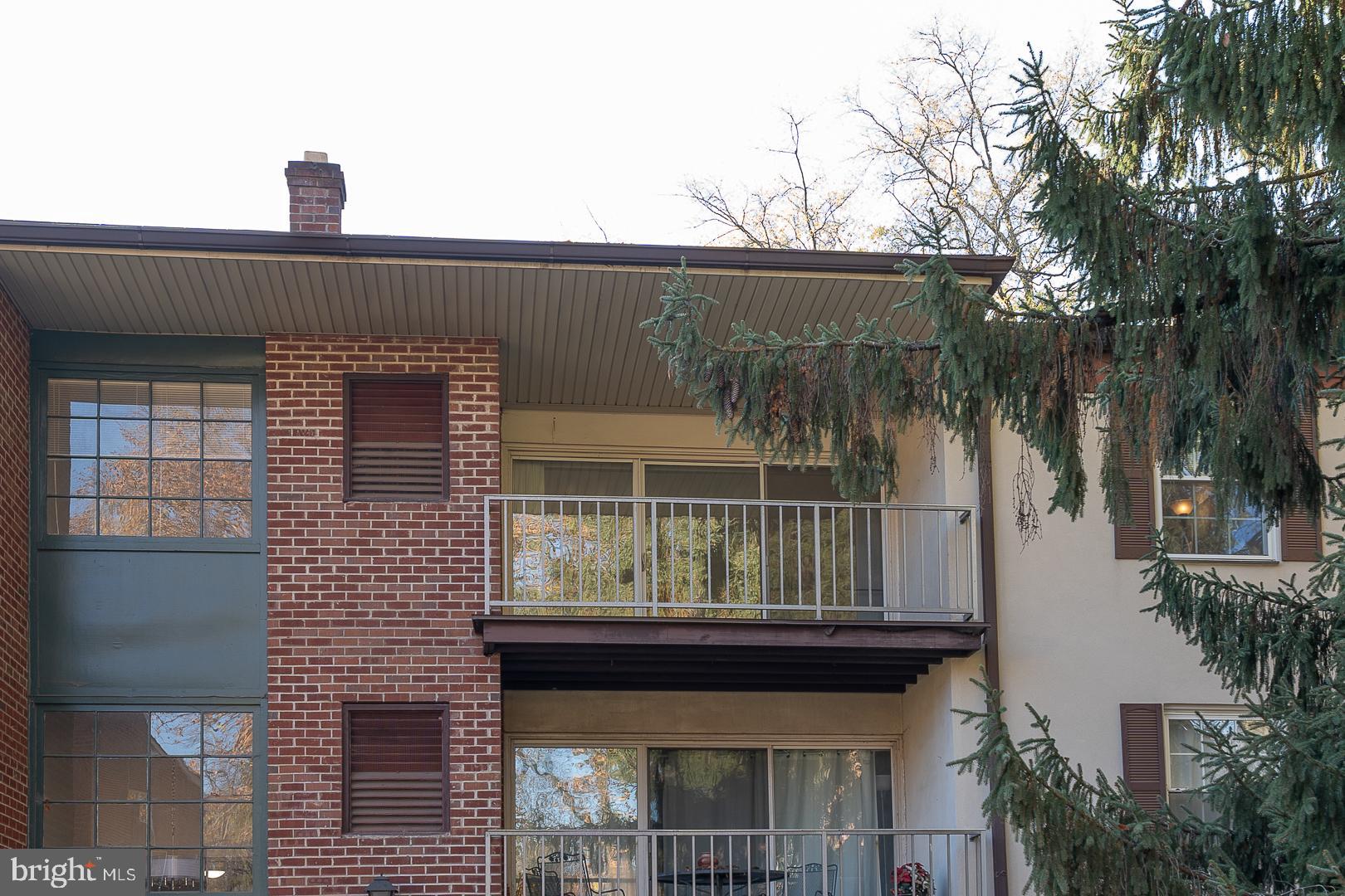 446 Drummers Lane Wayne, PA 19087 - Photo 2 of 29 a front view of a house with garden