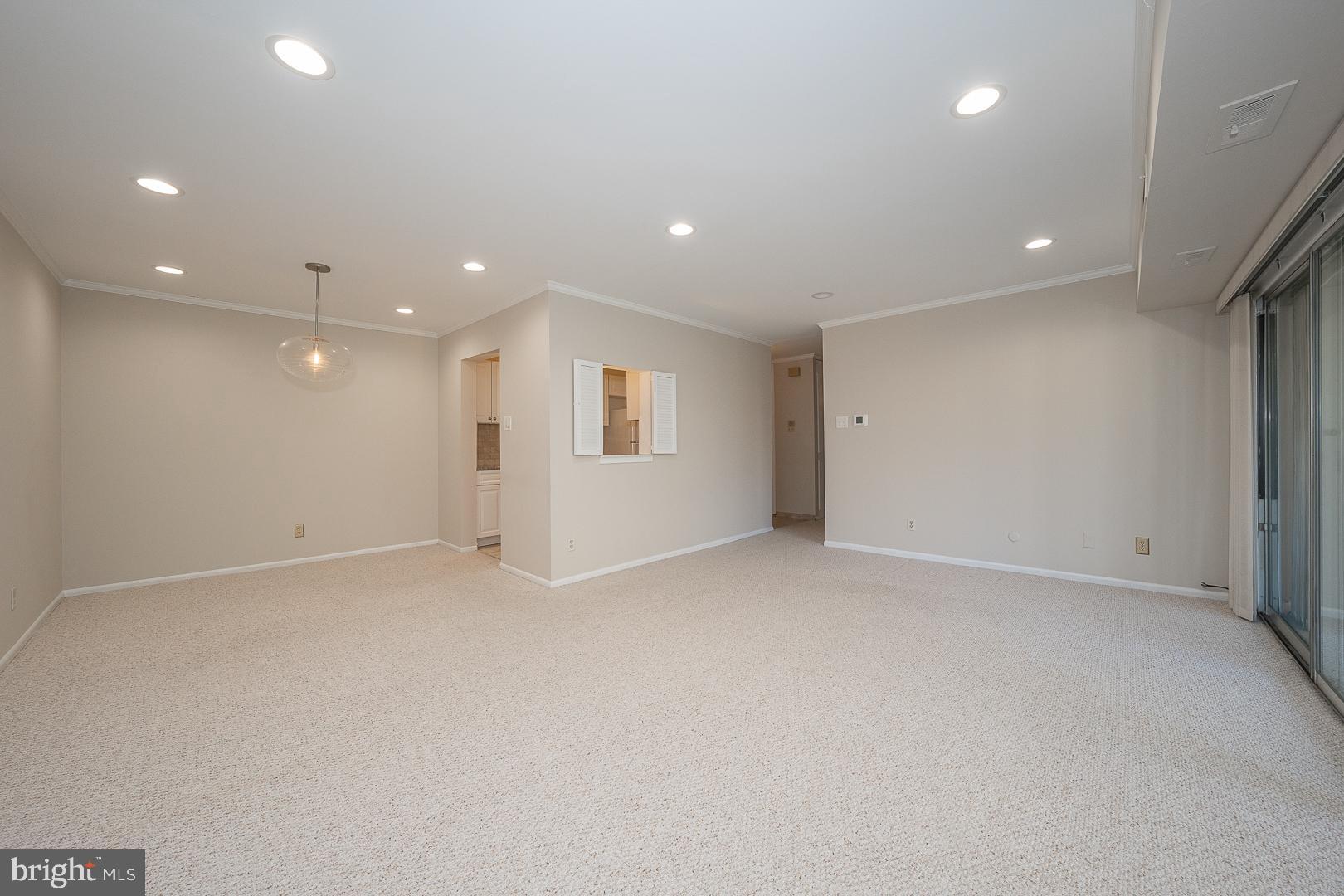 446 Drummers Lane Wayne, PA 19087 - Photo 6 of 29 an empty room with white floor and windows