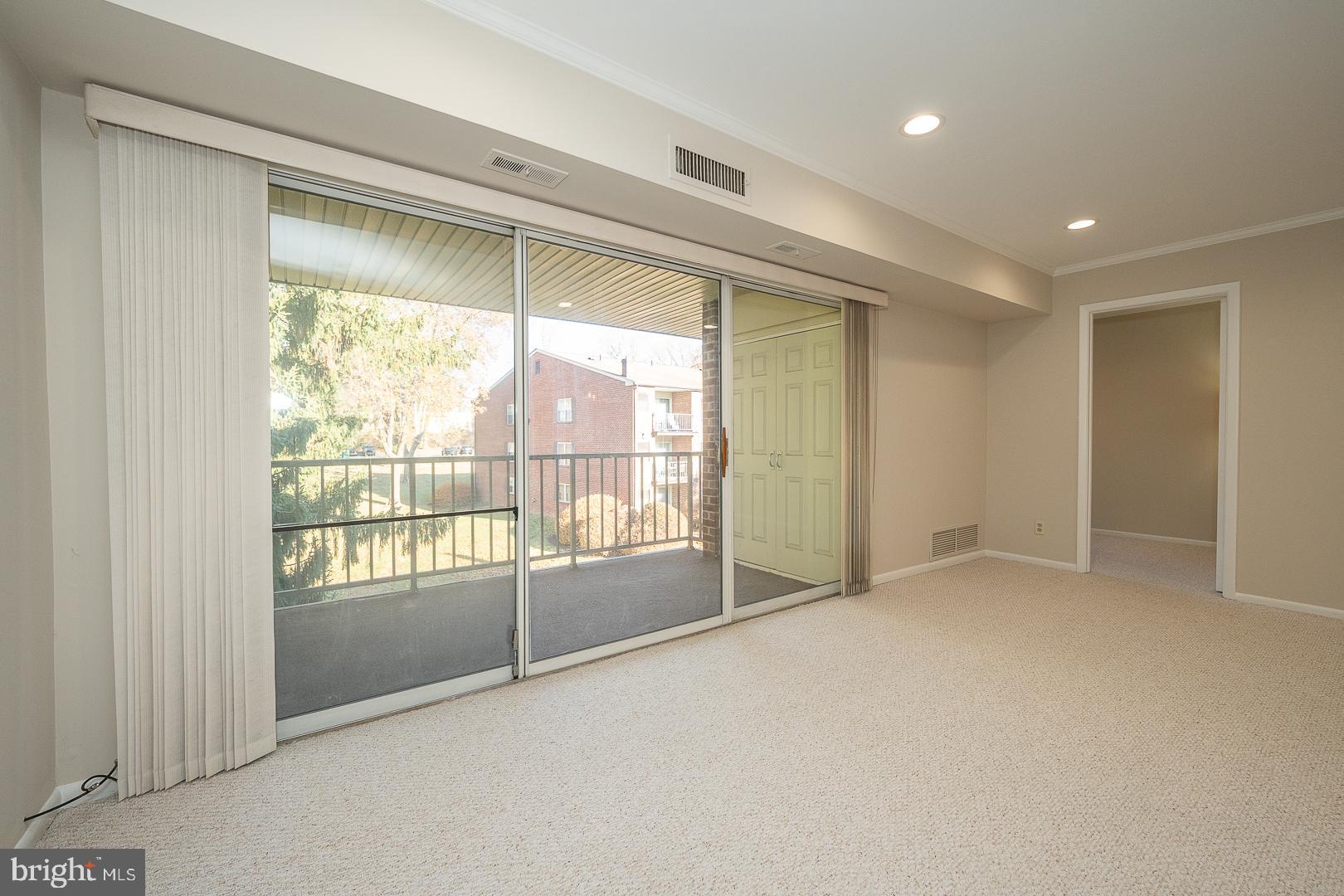 446 Drummers Lane Wayne, PA 19087 - Photo 8 of 29 a view of an empty room and window