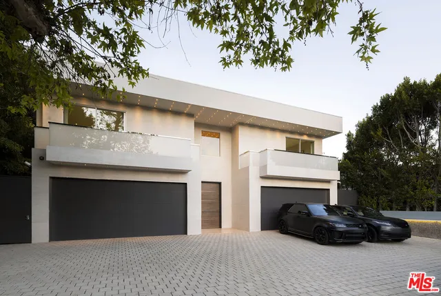 a black and white building with a outdoor space
